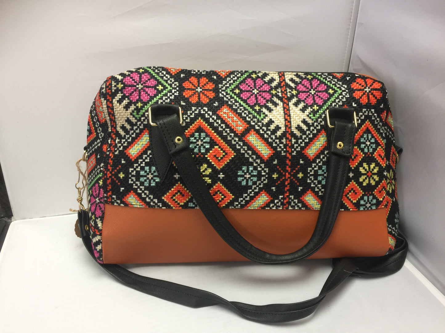 Handbag with native designs orange and black